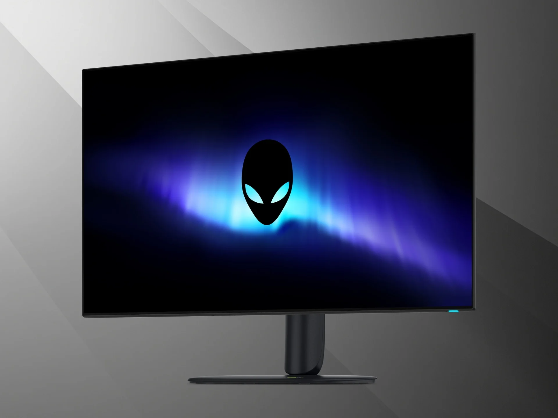 Monitor Alienware AW3226Q visto de frente, ligeiramente de lado, com o logótipo da Alienware no ecrã