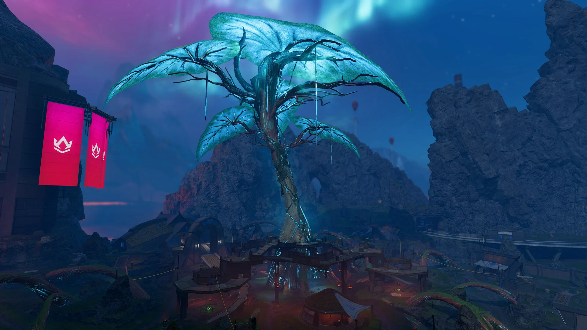 Um dos mapas do Apex Legends, com uma árvore luminosa e luz de aurora no céu