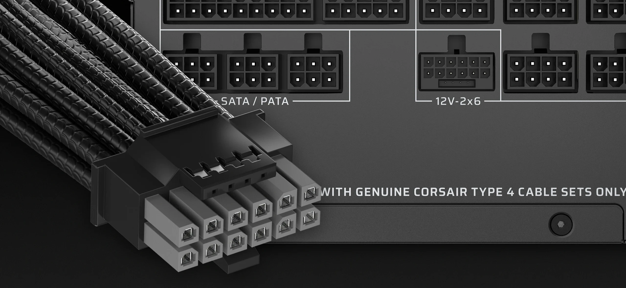 O cabo 12V-2x6 da Corsair RM1200e junto às tomadas modulares da fonte