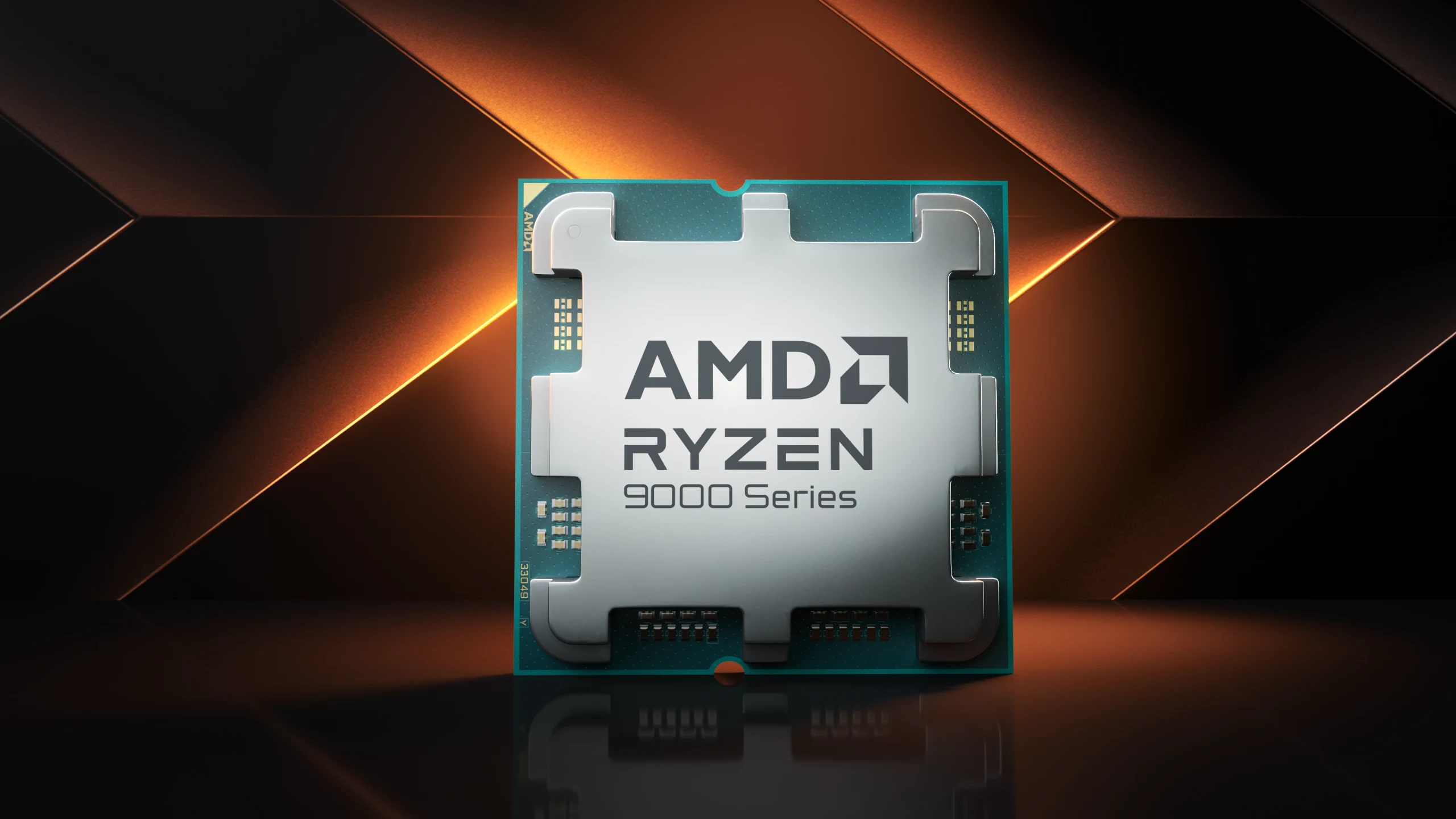 O chip AMD Ryzen 9000 sobre um fundo escuro com luz cor de laranja