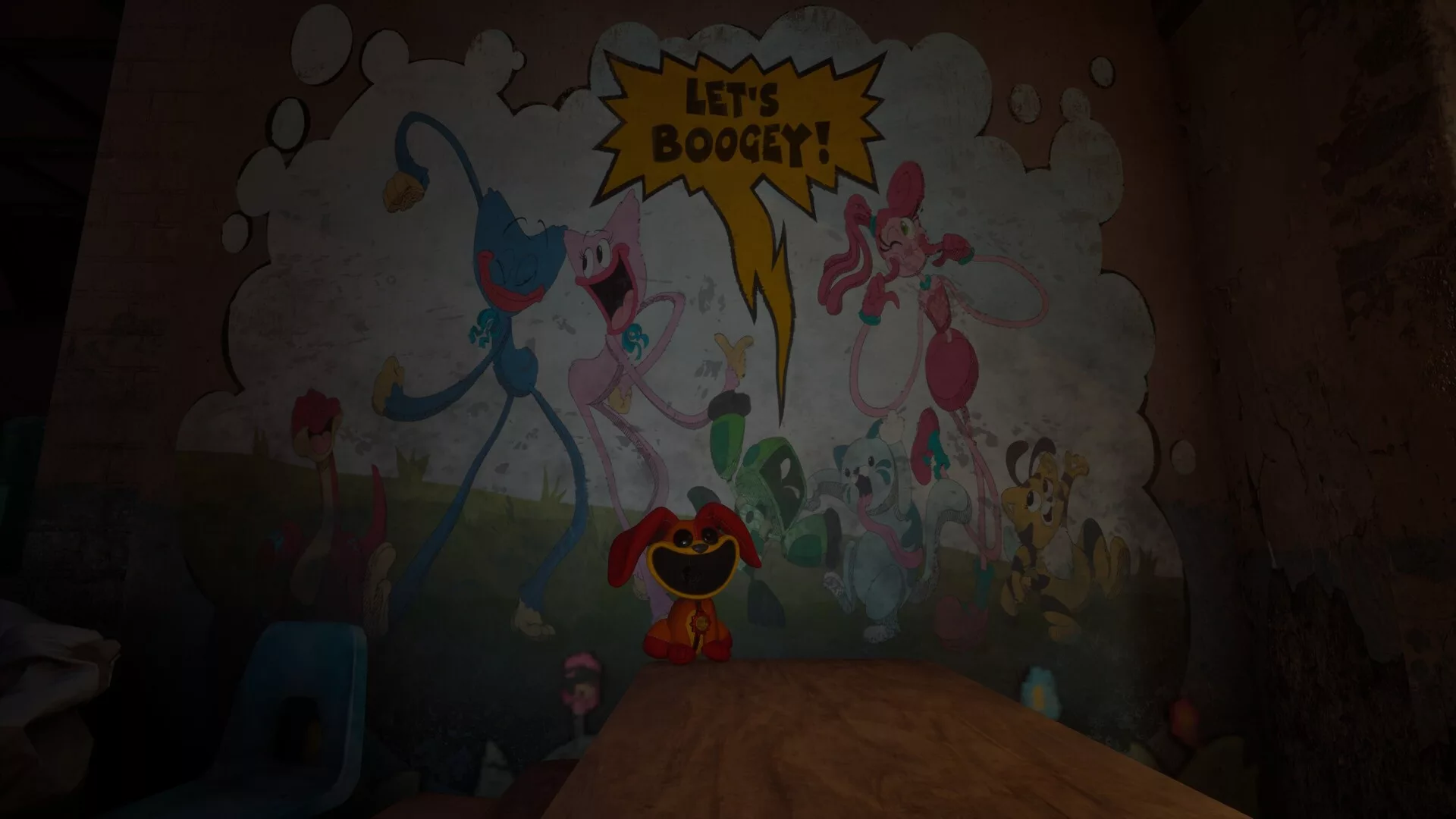 Sala da fábrica da Playtime Co. com um mural dos Smiling Critters e um boneco no chão