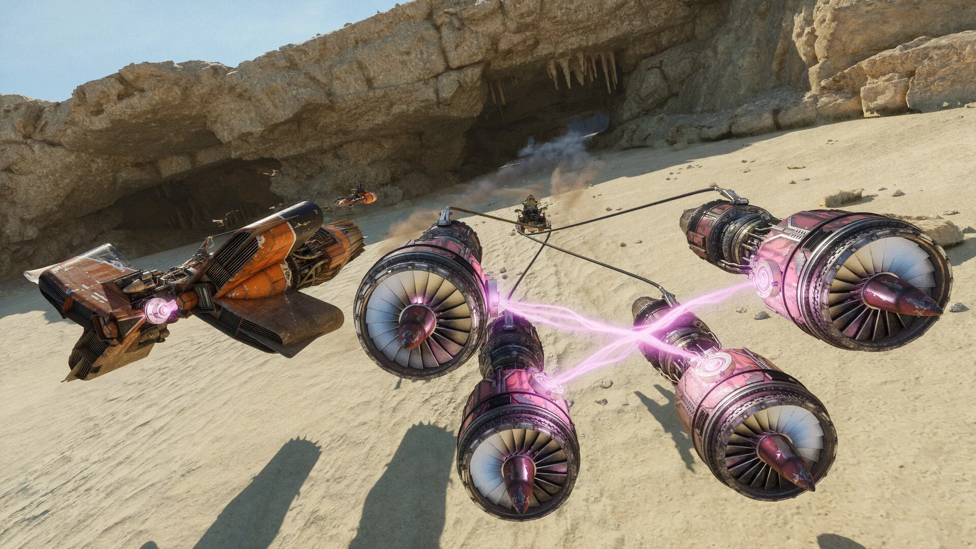 Podracer de dois motores numa pista de areia junto às rochas