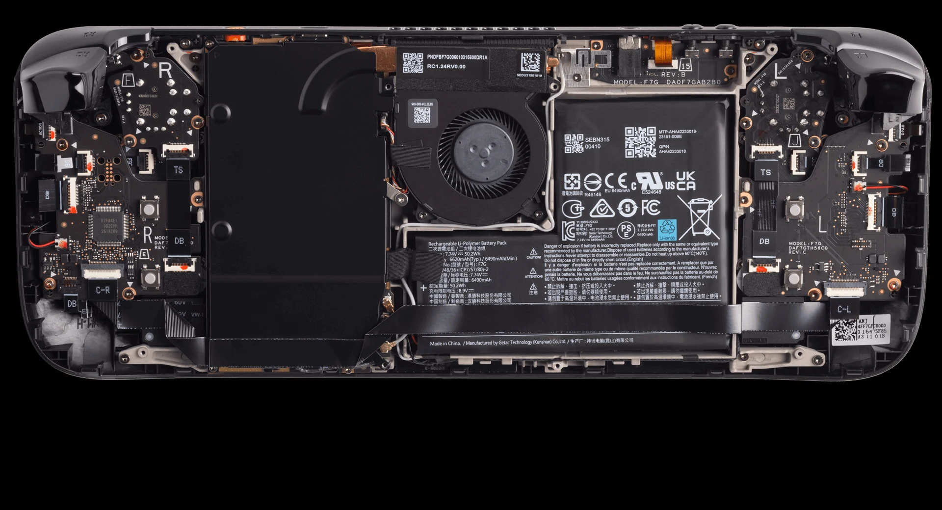 Steam Deck OLED aberta, com a placa, a ventoinha e a bateria à vista